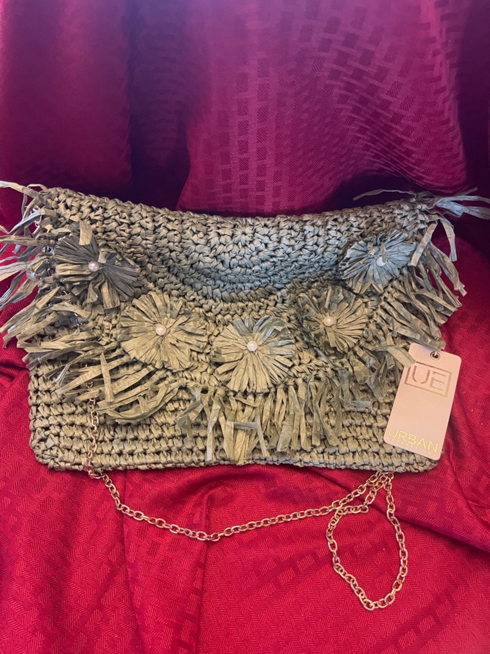 Urban Expressions sage green woven clutch with floral fringe